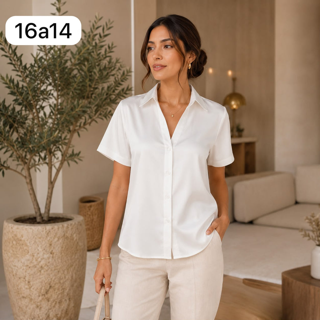 BLUSA DE SEDA CON ENCAJE EN LA ESPALDA