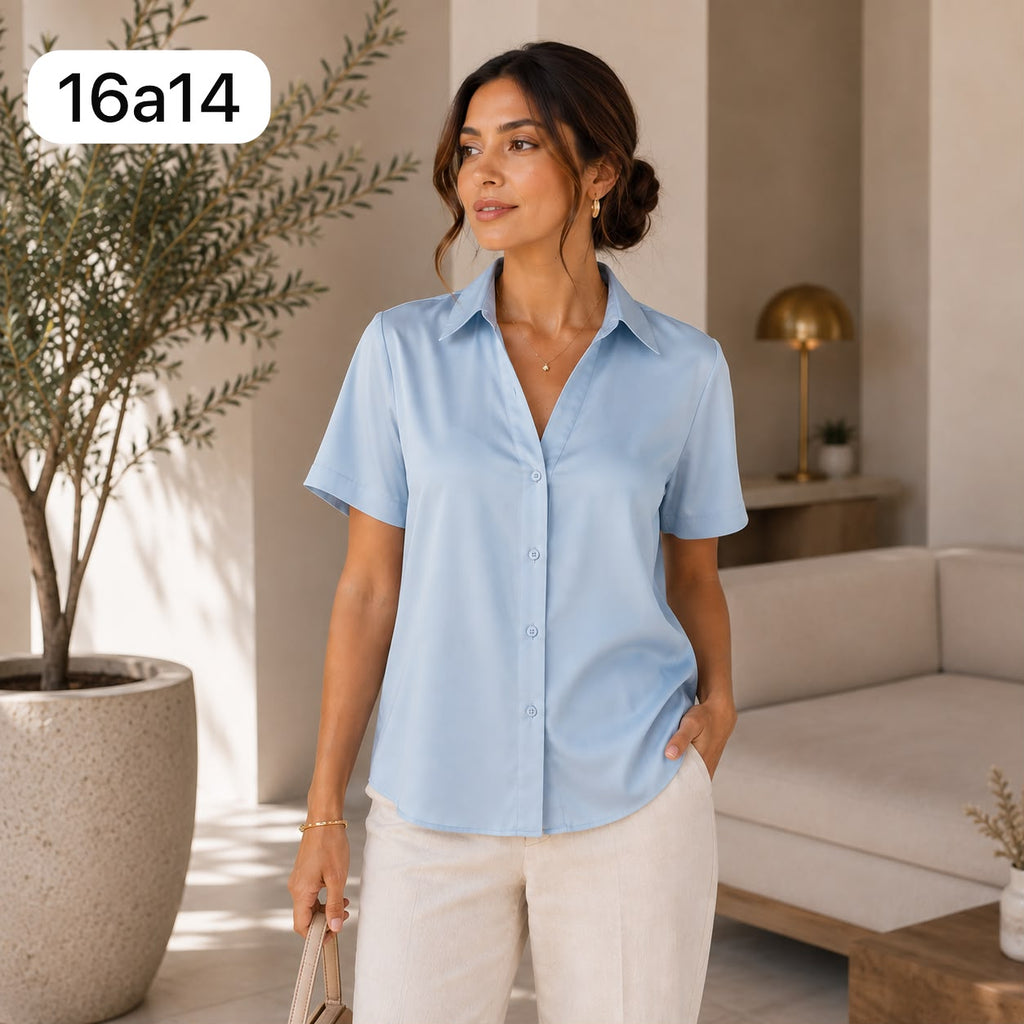 BLUSA DE SEDA CON ENCAJE EN LA ESPALDA