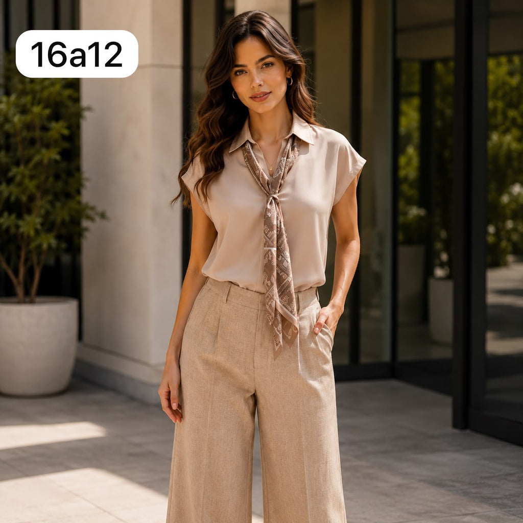BLUSA DE SEDA CON CORBATA Y ESTAMPADO