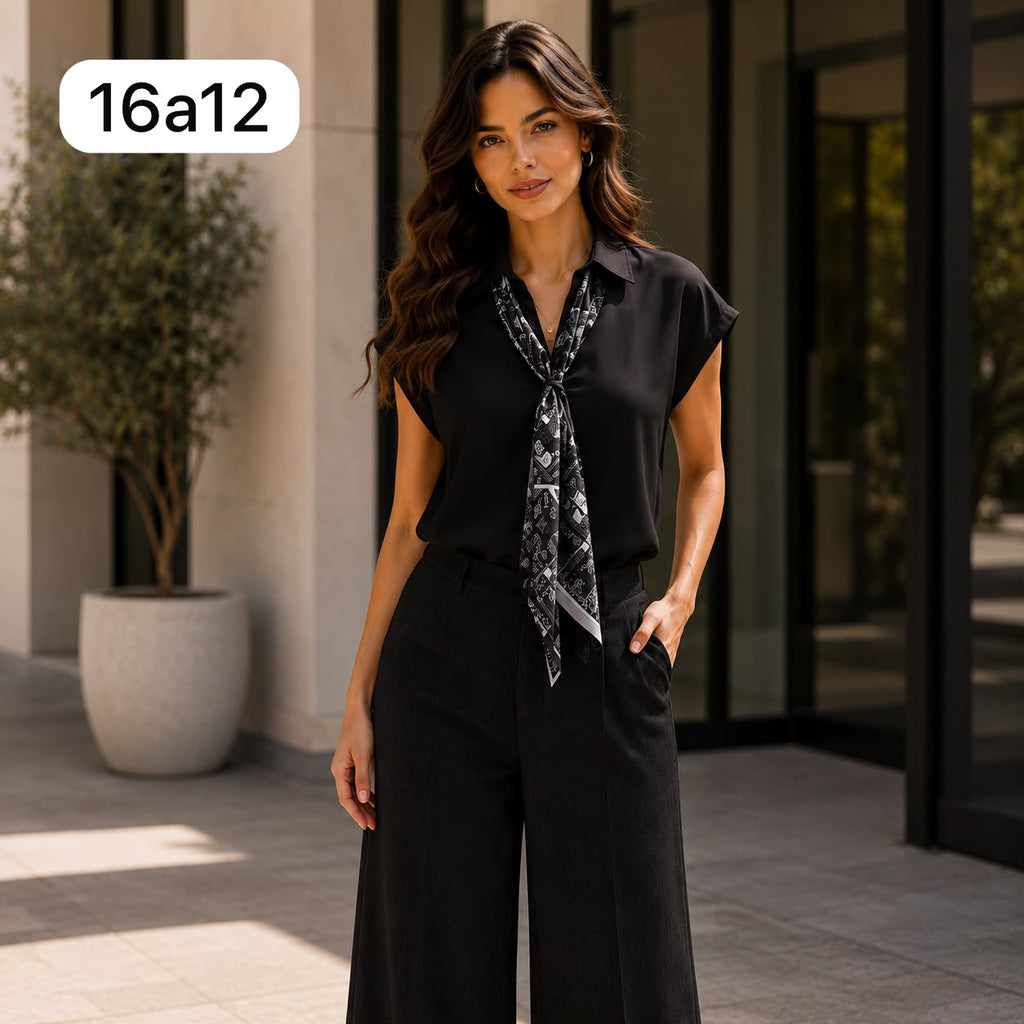 BLUSA DE SEDA CON CORBATA Y ESTAMPADO
