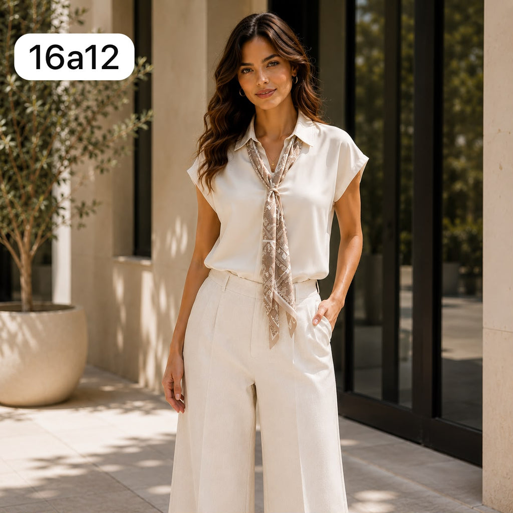BLUSA DE SEDA CON CORBATA Y ESTAMPADO
