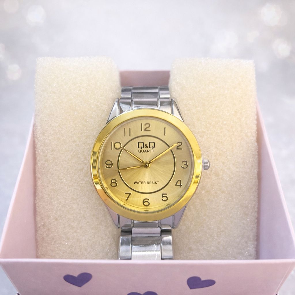 Reloj Q